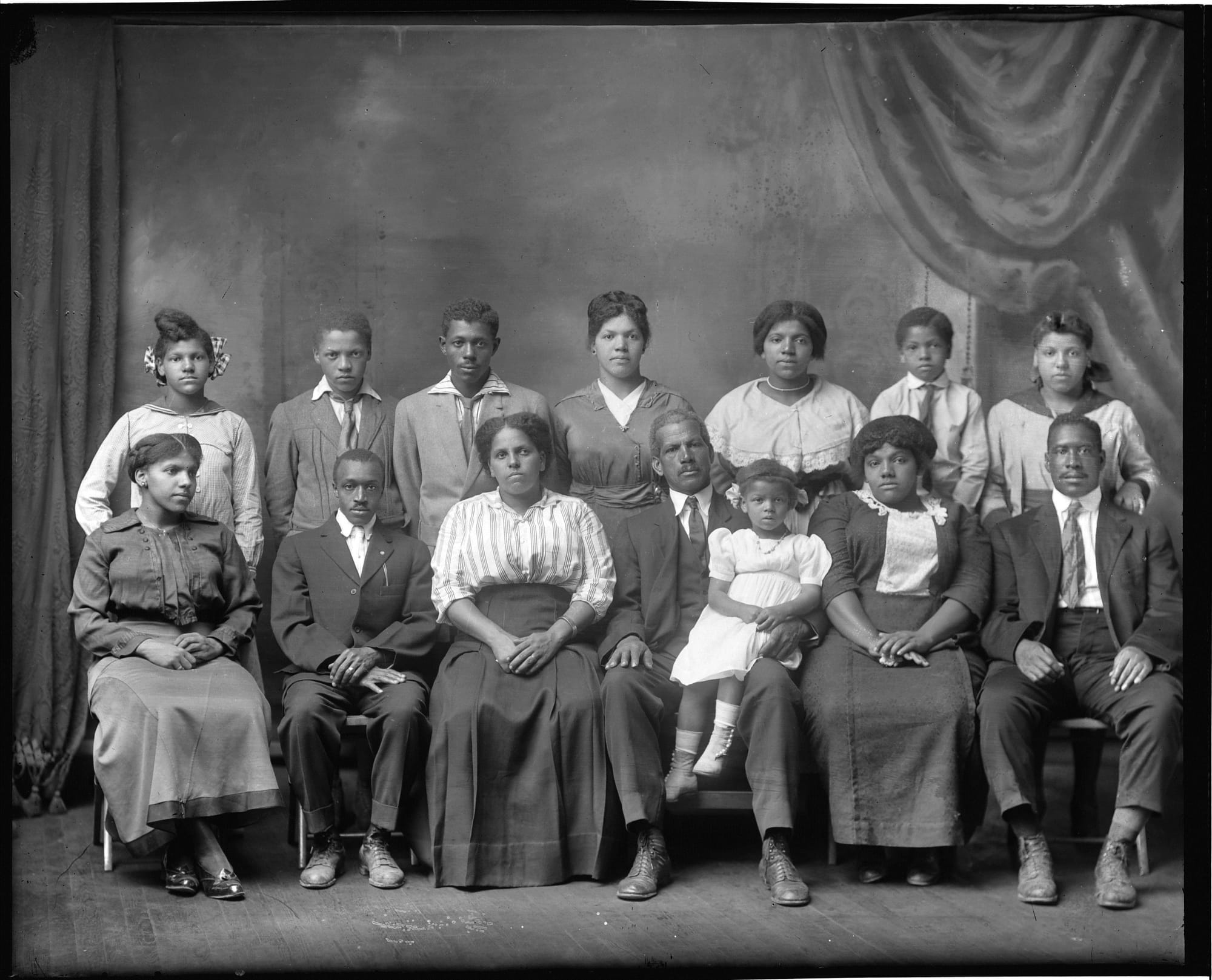 A photo of a historical Black family portrait