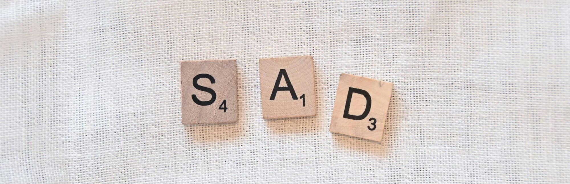 SAD written with letters